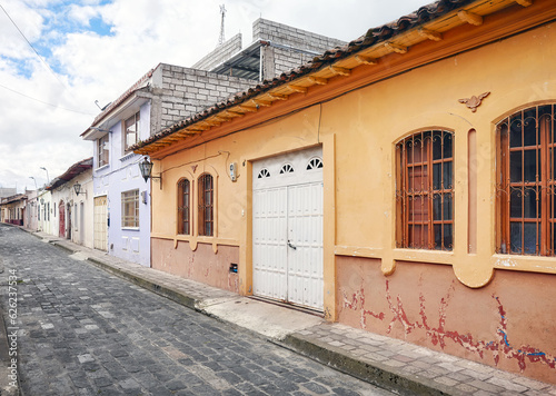 Street of Latacunga town paved with cobblestone, Ecuador. photo