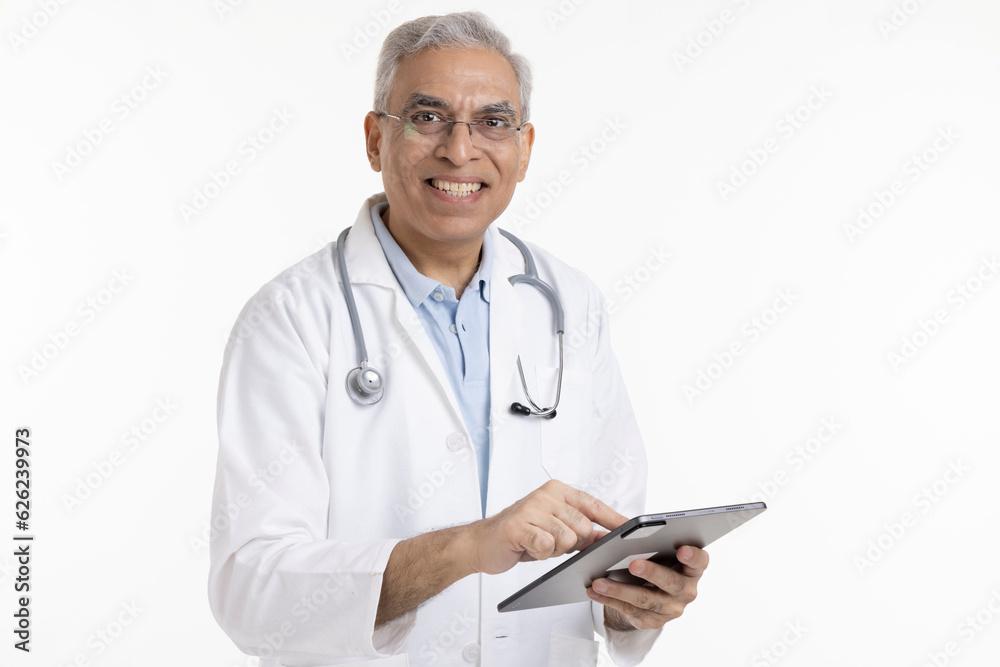 Portrait of a doctor using digital tablet. Portrait of a doctor using digital tablet.