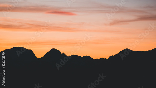 Beautiful mountain sunset with the silhouette of the peaks