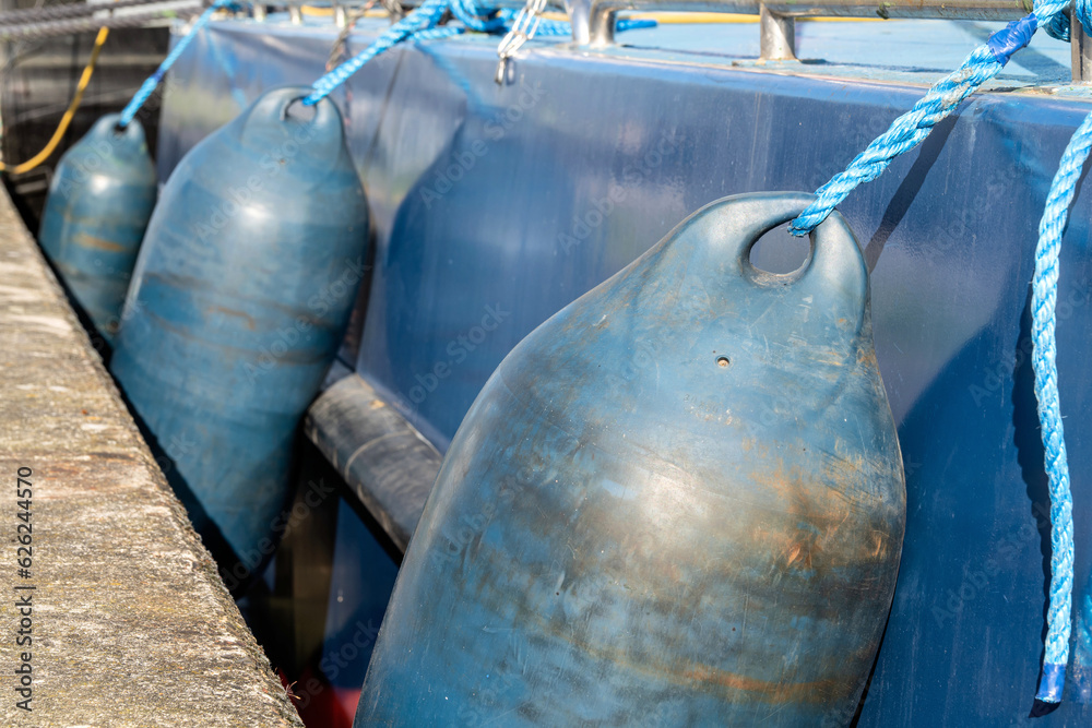 Fototapeta premium fenders protecting the side of a moored ship