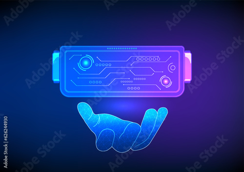 Virtual Reality Technology Hand holding a VR headset represents man made innovations in business and entertainment. It is a technology that allows you to enter the virtual world.