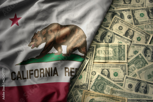colorful waving national flag of california state on a american dollar money background. finance concept
