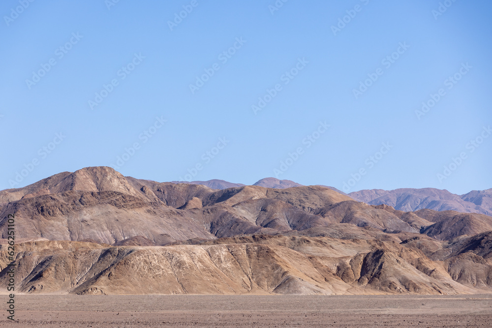 Colorful mountain range with a perfect blue sky near Pan de Azúcar National Park in the Atacama desert in Chile, South America
