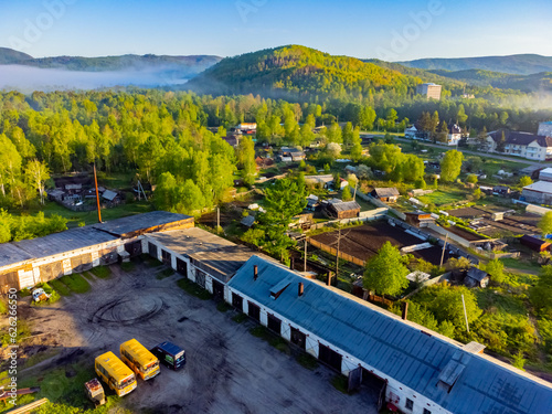 Photos of the hills and the village were taken from a drone in the early morning. Kuldur is an urban—type settlement in the Irradiation district of the Jewish Autonomous Region of Russia. Resort. 