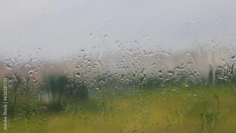 Raindrops on the window glass. Raindrops on the window pane. Raindrops on the windowpane. Raindrops on the window glass. Raindrops on the window pane. Raindrops on the windowpane.