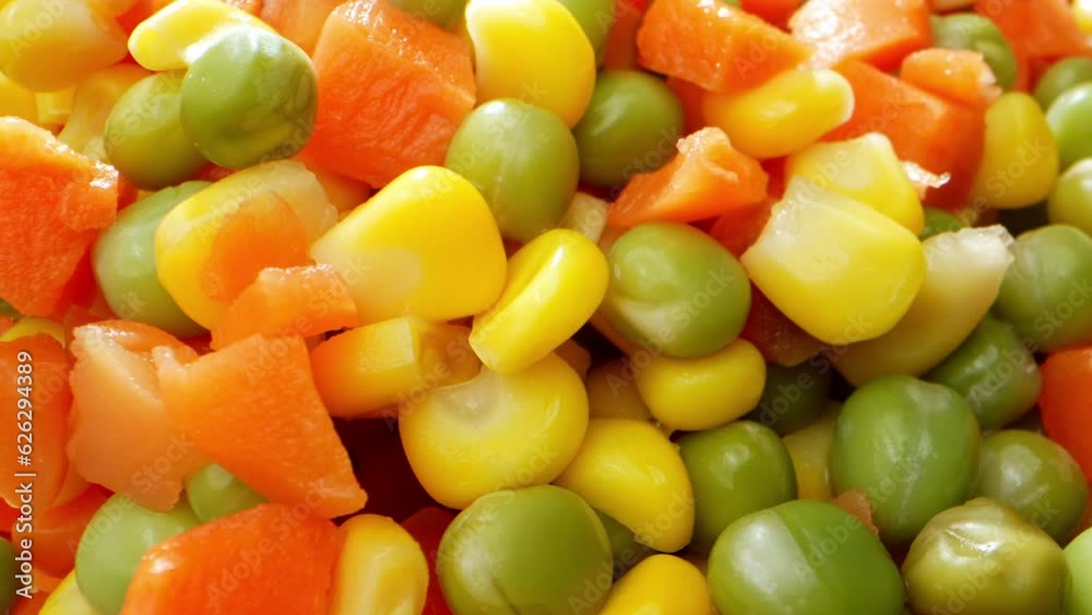 Macro video, vibrant frozen mixed vegetables dance inside a glass bowl. The ice crystals glisten, capturing of freshness and the medley of colors, The delicious and healthy culinary experience.
Macro video, vibrant frozen mixed vegetables dance inside a glass bowl. The ice crystals glisten, capturing of freshness and the medley of colors, The delicious and healthy culinary experience.