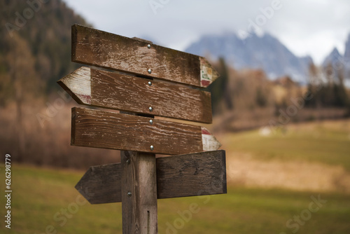 Sign for hiking trails in the Dolomites. Signpost on a hiking trail in the Alps.