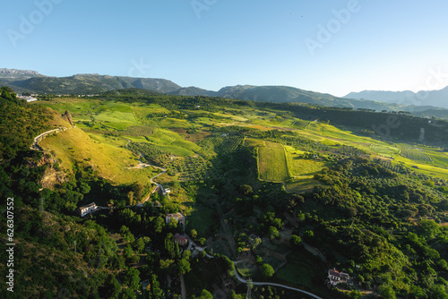 Aerial view of Ronda Valley with Sierra del Oreganal and Sierra Blanquilla Mountains - Ronda, Andalusia, Spain photo