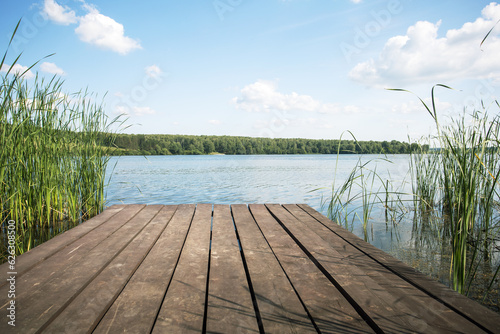 empty wooden pier of summer. place for  meditation in nature. place for text.