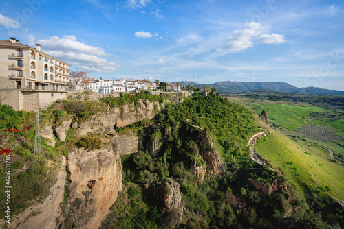 View of Ronda Buildings over the Cliff with Walls and Valley - Ronda, Andalusia, Spain