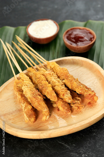 Telur Gulung, Rolled Egg Omelette with Skewers.