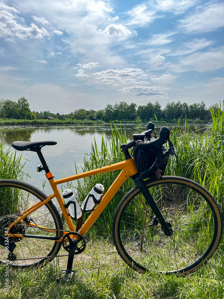 Gravel bicycle in the city park on the spring season Gravel bicycle in the city park on the spring season