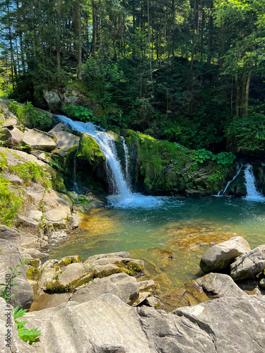 Perfect landscape with waterfall in the Carpathian Mountains. West part on Ukraine, small waterfall in the wild river.