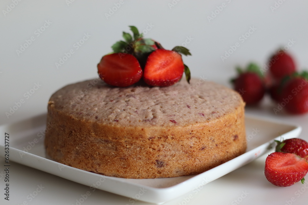 Strawberry cake. A simple tea time cake, flavored with fresh strawberry puree Strawberry cake. A simple tea time cake, flavored with fresh strawberry puree