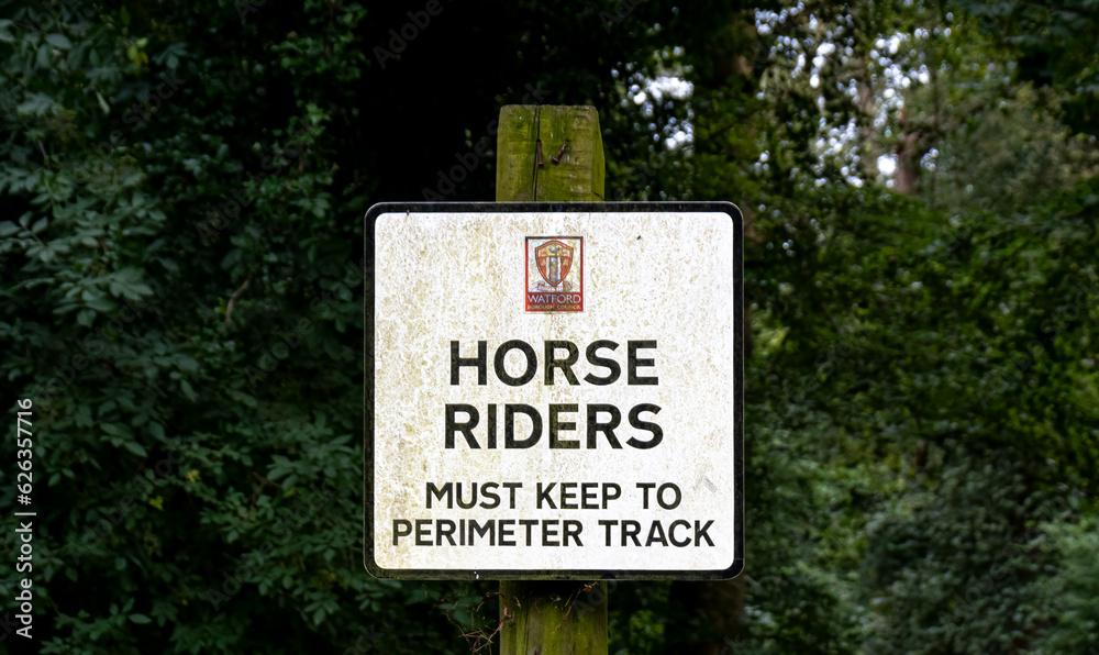 Horse riding sign in the UK. Horse riders must keep to the perimeter track