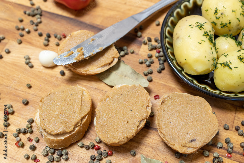 three pieces of bread with homemade pate applied to them three pieces of bread with homemade pate applied to them