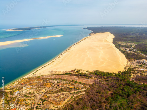 High angle Drone Point on the Dune of Pilat, 60 km southwest of Bordeaux, along France's Atlantic coastline. It is is the tallest sand dune in Europe with a height of about 106 metres above sea level.