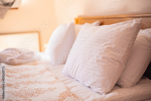 pillows on the bed in the hotel room, cozy atmosphere rest