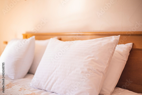 pillows on the bed in the hotel room, cozy atmosphere rest
