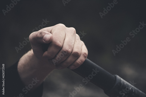 Oar photo of man rowing river raft