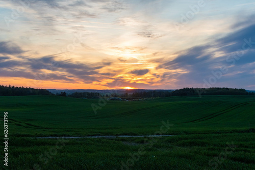 sunrise over the field © Grzegorz
