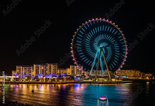 Spiral lights on structure of Ain Dubai Observation Wheel on BlueWaters Island at night photo