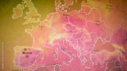 Hot climate over Europe satellite. Camera shot computer screen monitor. Camera shot computer screen monitor. Pixels visible. 