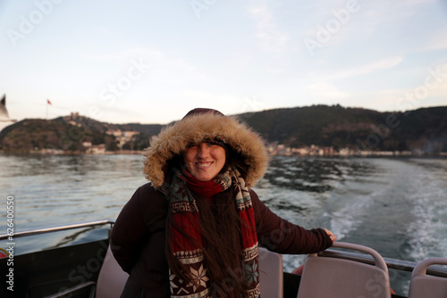 A woman in a ferry in Bosphorus Istnabul photo