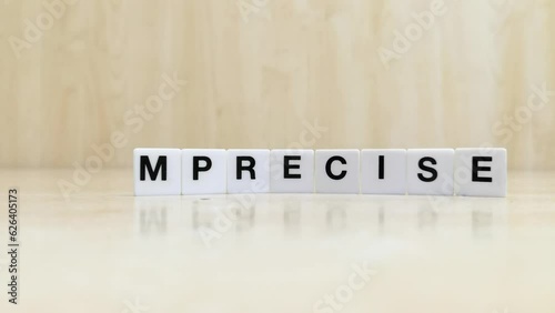  Tiles that make up the word imprecise are modified to make up the word precise
