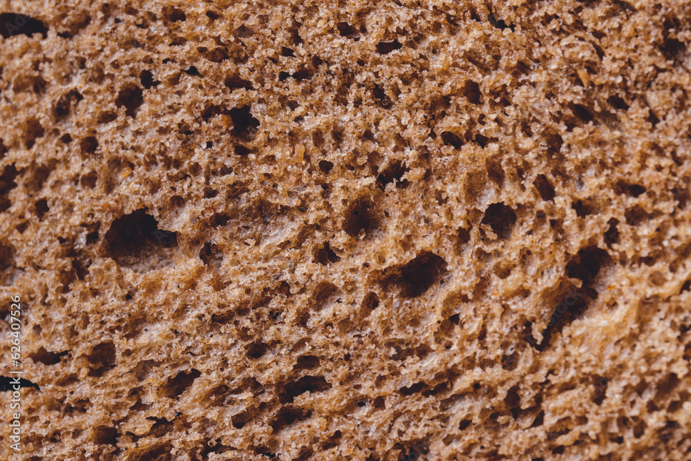 Brown bread texture, closeup background. Macro shot Brown bread texture, closeup background. Macro shot