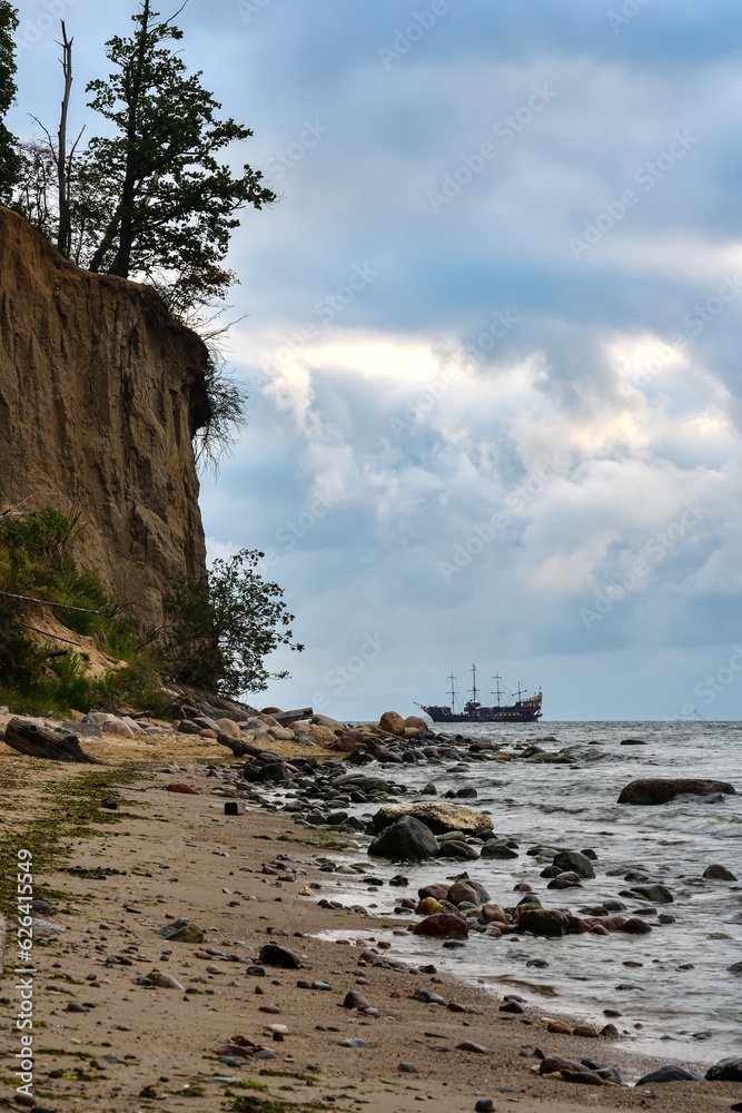 Beautiful landscape on the Polish Baltic Sea. Beach with stones and a beautiful cliff in Gdynia Orlowo, Poland.