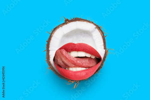 Half of ripe coconut on lig...