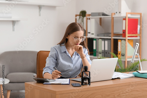 Female accountant working w...