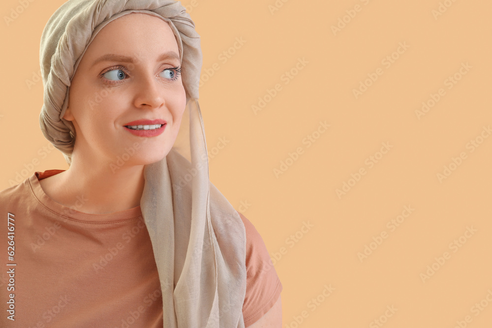 Young woman after chemotherapy on beige background, closeup Young woman after chemotherapy on beige background, closeup