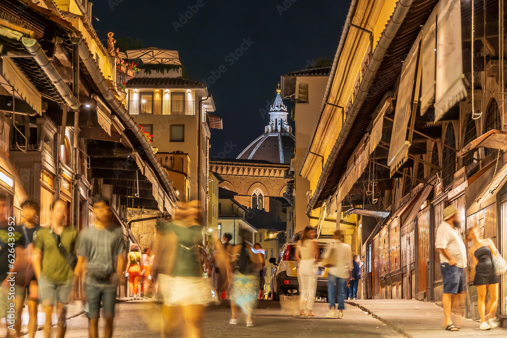 Shopping street on Ponte Vecchio over Arno river in Florence, Italy