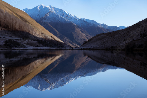 New Zealand Landscape near Queenstown with lake and reflection at sunrise