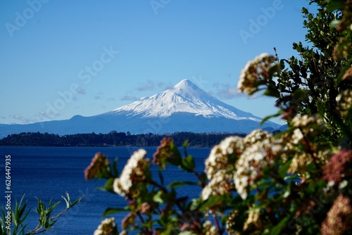 View of a volcano and a lake during spring