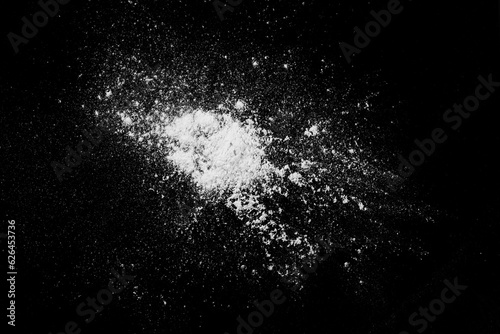 Explosion of white dust particle isolated