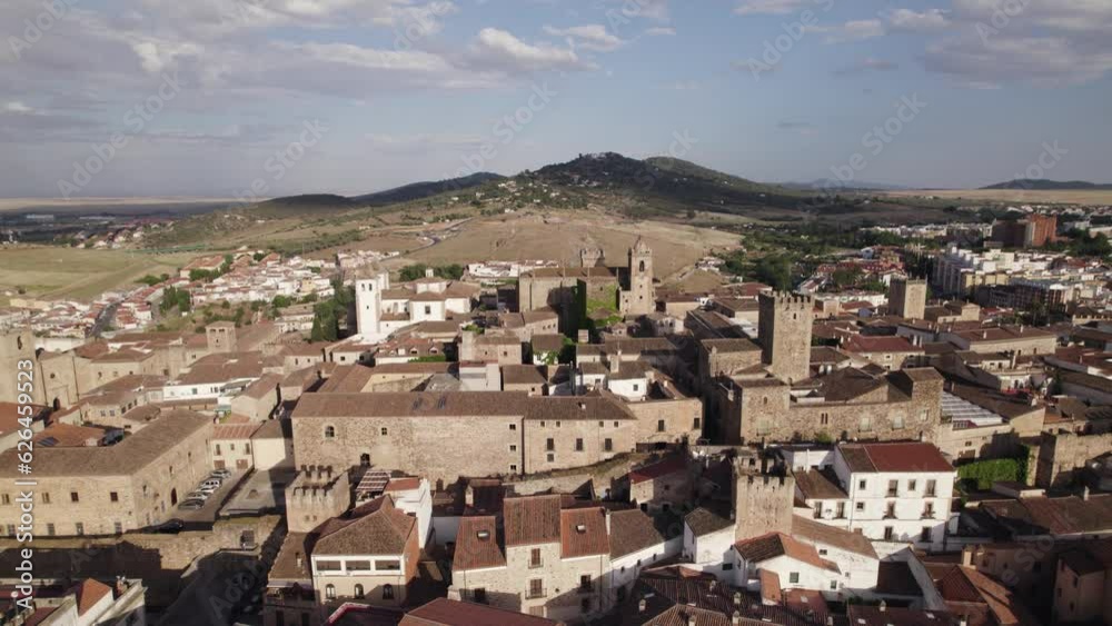 Charming medieval city, vast countryside backdrop, aerial orbit. Caceres, Spain Charming medieval city, vast countryside backdrop, aerial orbit. Caceres, Spain