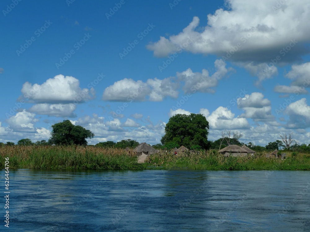 Village on the bank of the rising Zambezi Village on the bank of the rising Zambezi