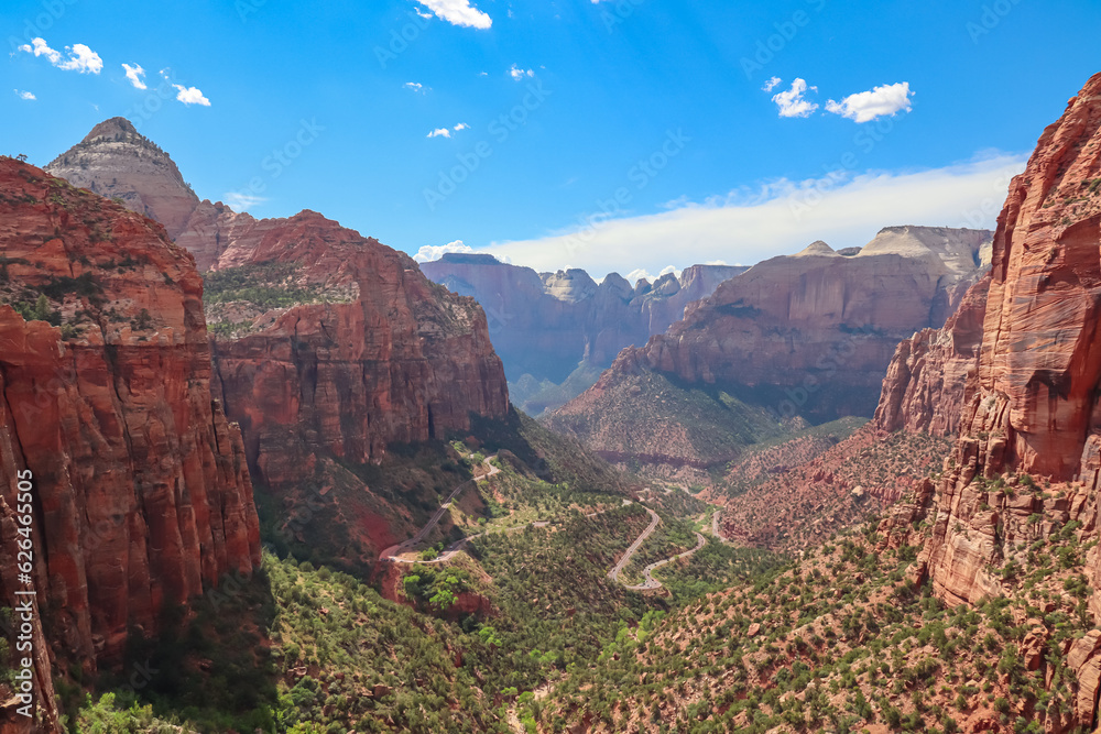 Naklejka premium Panoramic aerial view from Zion National Park Canyon Overlook, Utah, USA. Tranquil atmosphere in wilderness. Uninhabited canyon with majestic rock formations and steep cliffs. Mount Carmel highway