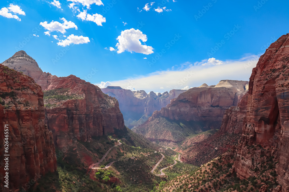 Naklejka premium Panoramic aerial view from Zion National Park Canyon Overlook, Utah, USA. Tranquil atmosphere in wilderness. Uninhabited canyon with majestic rock formations and steep cliffs. Mount Carmel highway