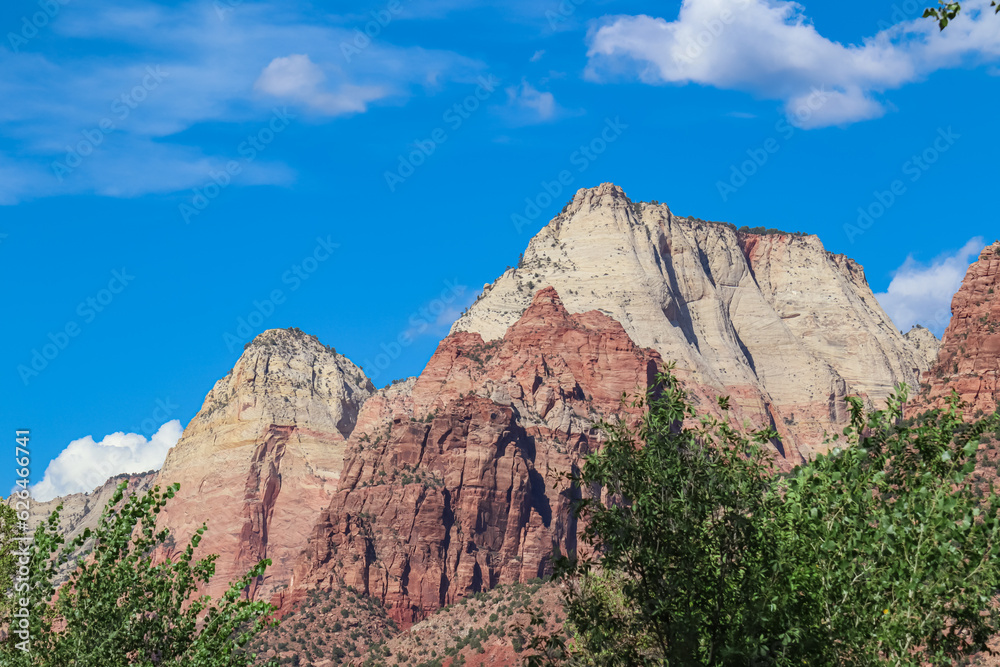 Scenic view of Navajo Sandstone mountain peaks Twin Brothers in Zion National Park in Washington County, Utah, United States, USA. Southwest aspect centered, viewed from Springdale. Uninhabited canyon