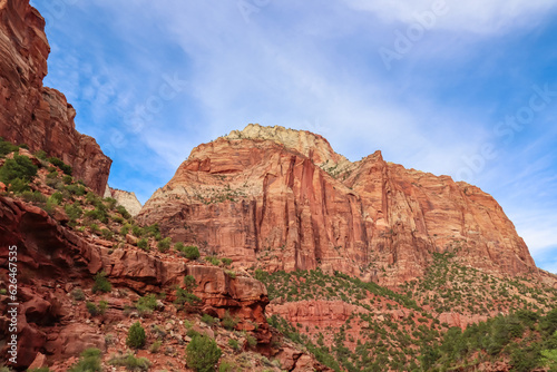 Scenic view of Navajo Sandstone mountain peak Mount Carmel in Zion National Park in Washington County, Utah, United States, USA. Southwest aspect centered, viewed from Springdale. Uninhabited canyon