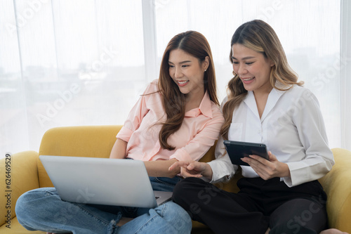 asian female couple at living room