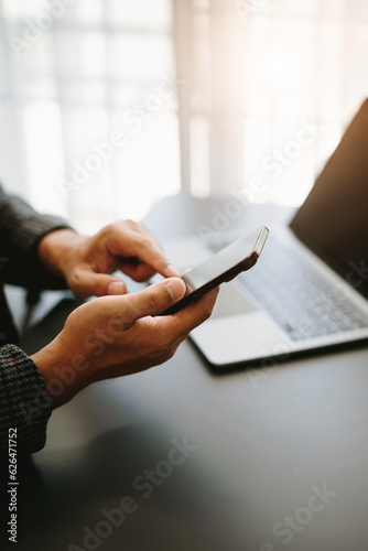 person working on tablet computer