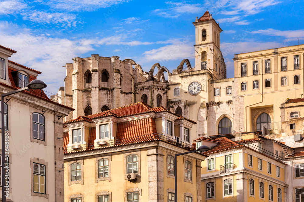 Historic buildings in central Lisbon, Portugal, with the Carmo Convent ruins, destroyed by an earthquake in 1755.
