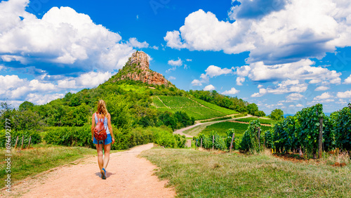 Woman tourist walking to Solutre Rock- Burgundy in France photo