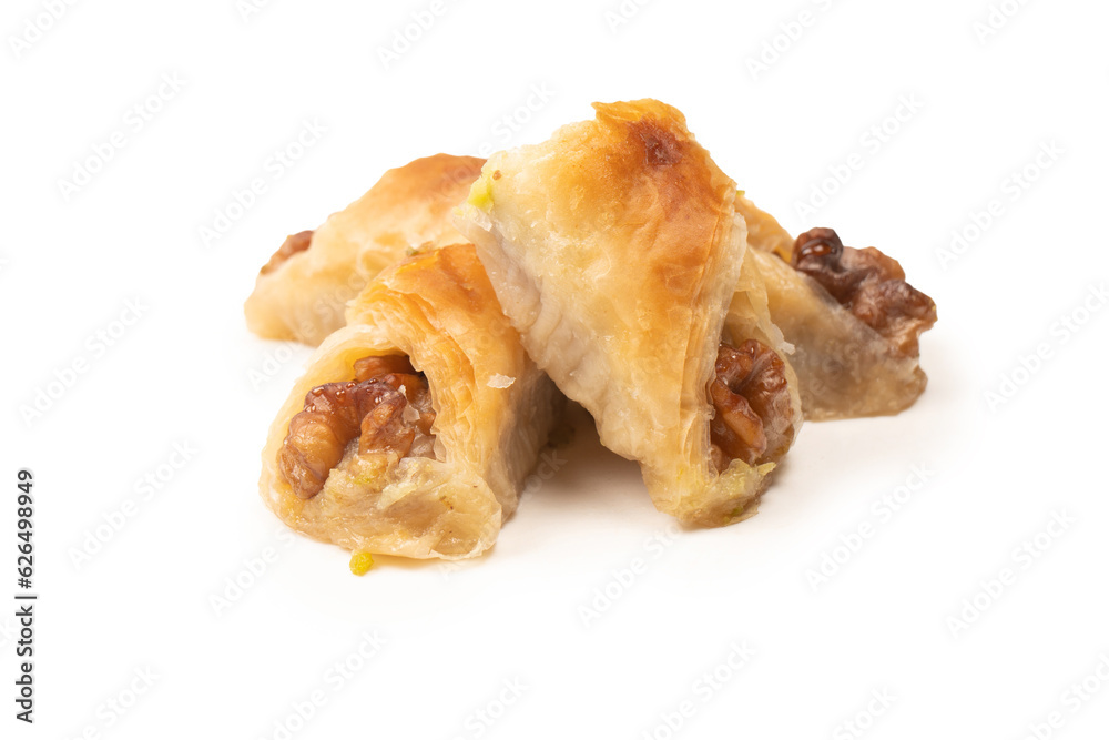 Delicious sweet baklava with walnuts isolated on white background. Delicious sweet baklava with walnuts isolated on white background.