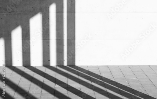 Abstract black and white space with shadow on concrete wall Used for textured backgrounds.